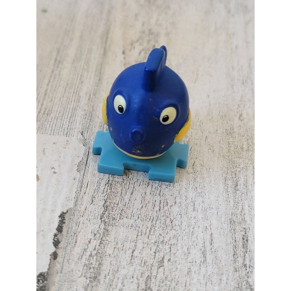 Disney squeakers fish puzzle piece toy figure doc McStuffins